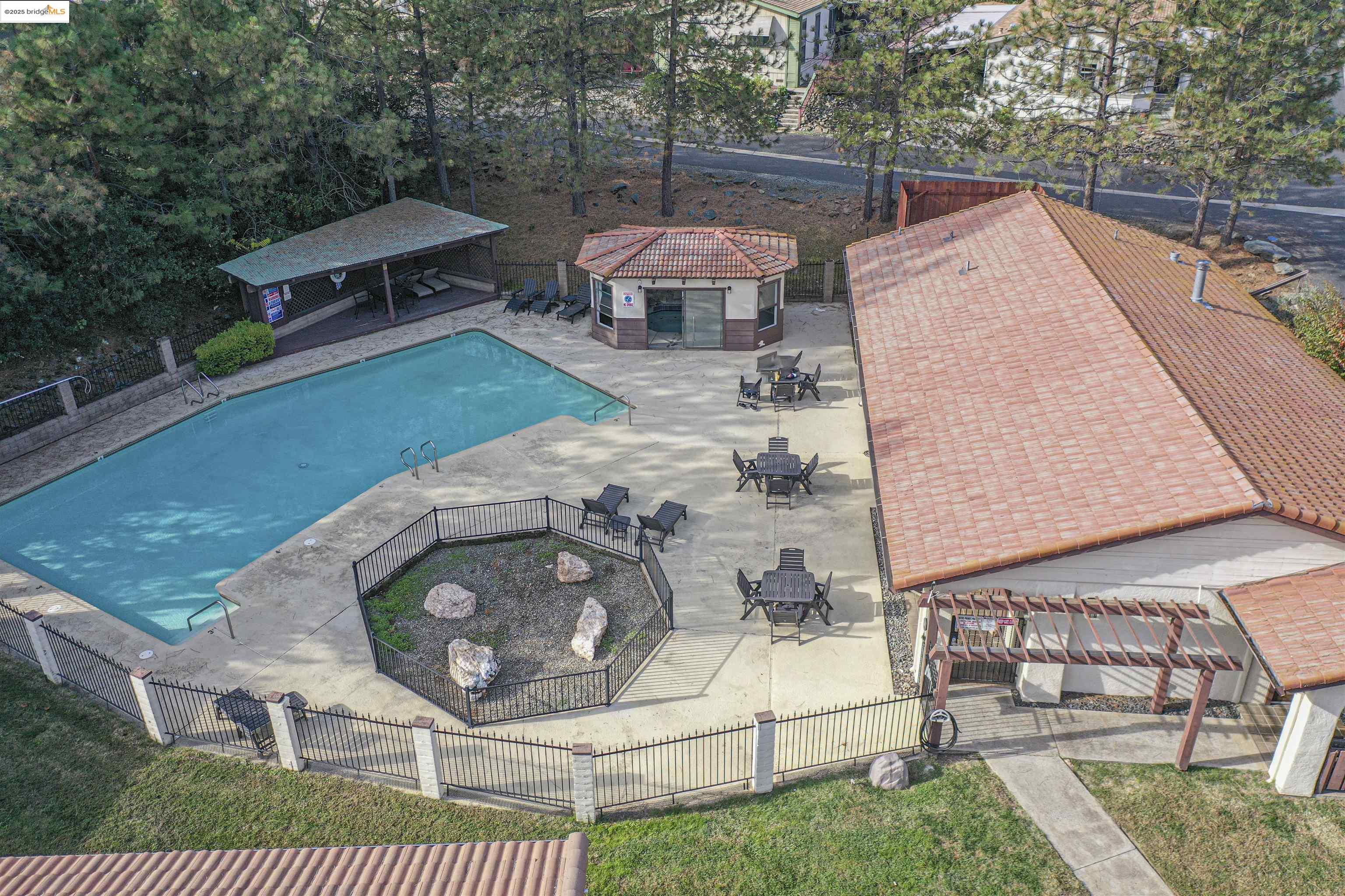 18717 Mill Villa Road, Unit 156 Jamestown, CA 95327 - Photo 28 of 40 Community pool with a patio area, outdoor dining area, and an outbuilding