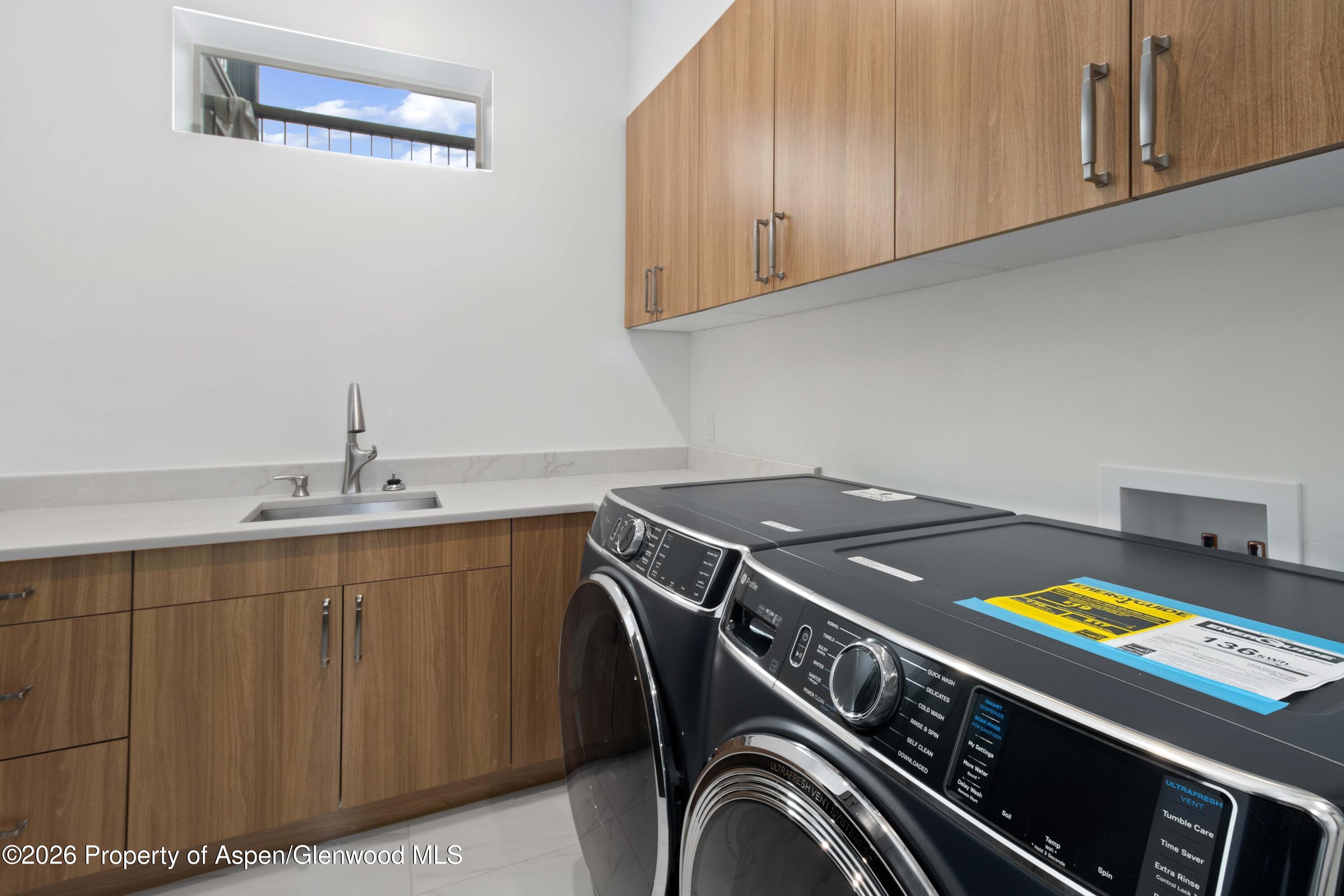 342 Faas Ranch Road New Castle, CO 81647 - Photo 18 of 29 a utility room with dryer and washer