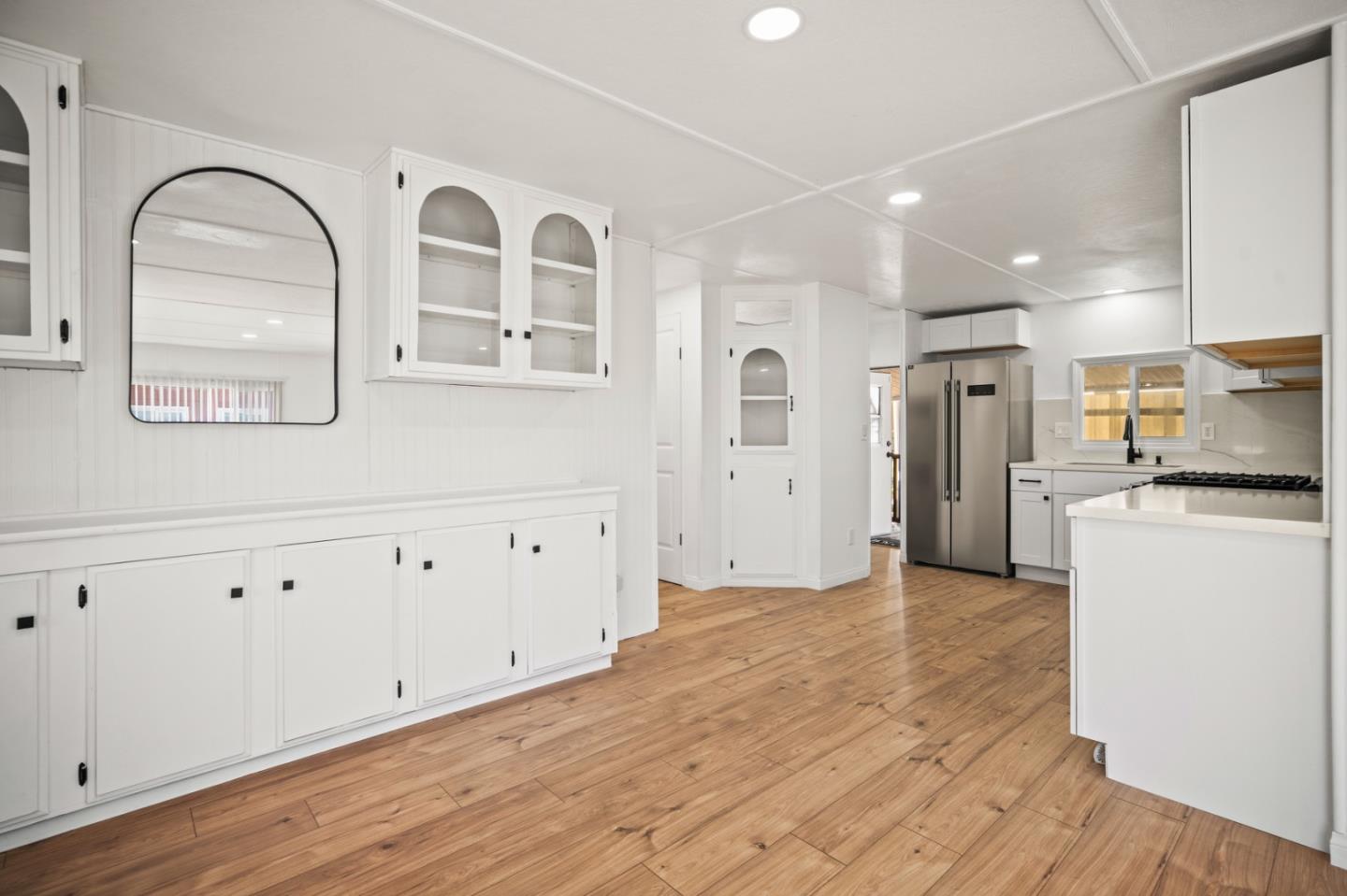 55 San Juan Grade Road, Unit 63 Salinas, CA 93906 - Photo 2 of 37 a view of a kitchen with wooden cabinet