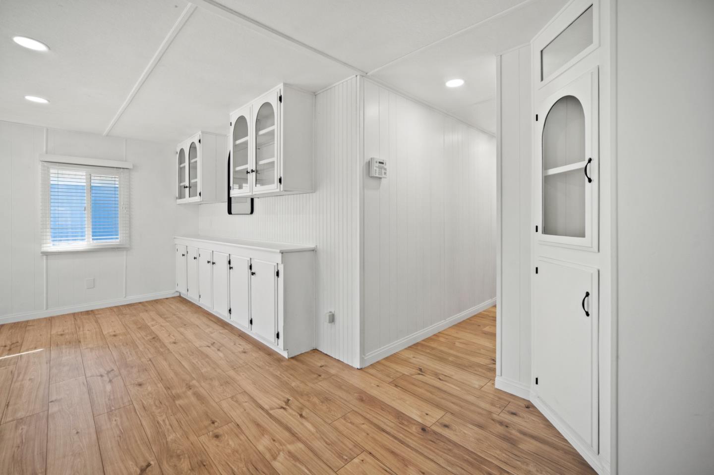 55 San Juan Grade Road, Unit 63 Salinas, CA 93906 - Photo 24 of 37 a view of a hallway with wooden floor