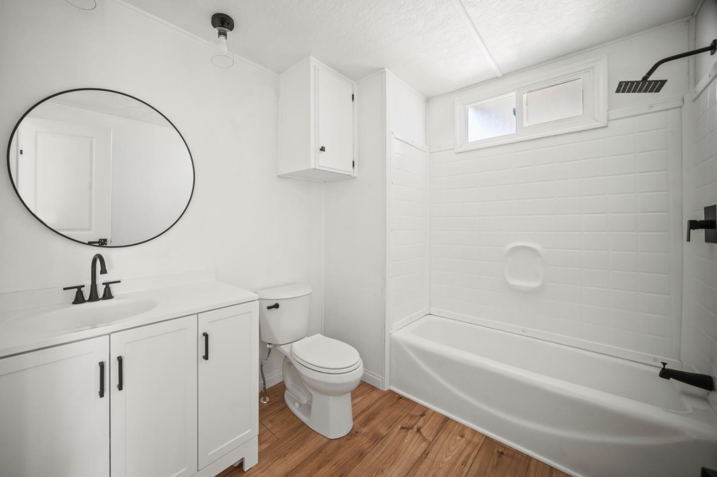 55 San Juan Grade Road, Unit 63 Salinas, CA 93906 - Photo 7 of 37 a bathroom with a sink a toilet and shower