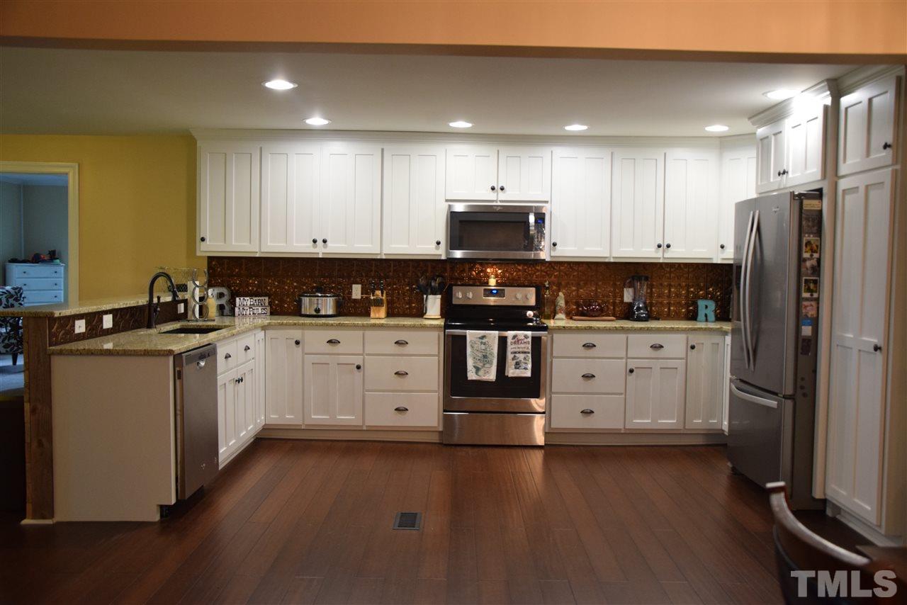 2507 Lynch Store Road Mebane, NC 27302 - Photo 5 of 24 Custom cabinets, Stainless appliances, Granite Counters