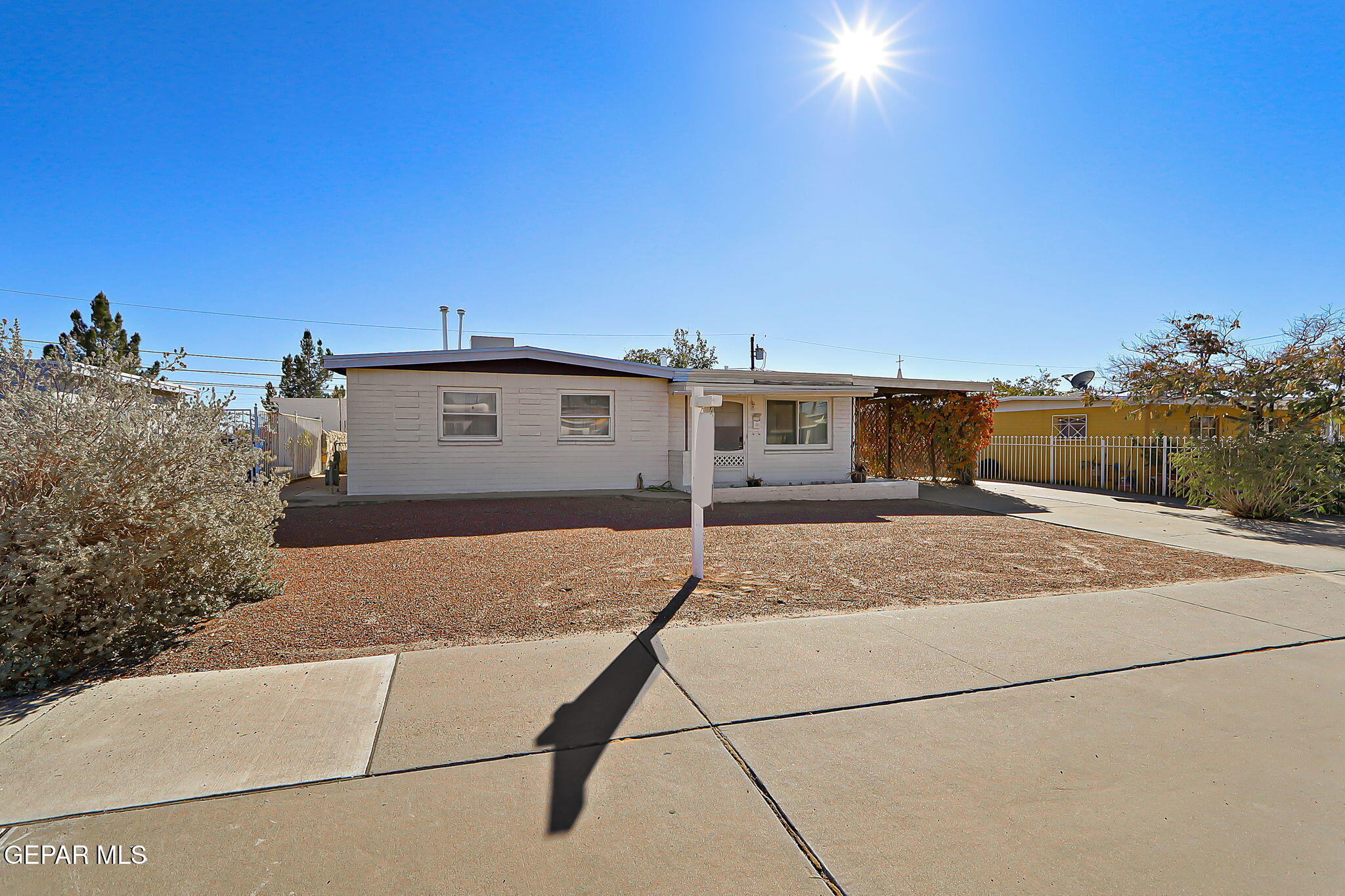 7906 Santa Maria Road El Paso, TX 79915 - Photo 3 of 26 a view of a house with a backyard