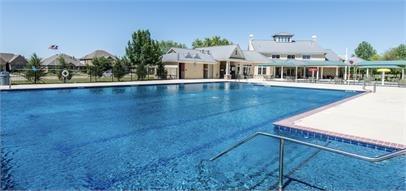 1005 Lake Woodland Drive Little Elm, TX 75068 - Photo 30 of 37 Community pool featuring a patio