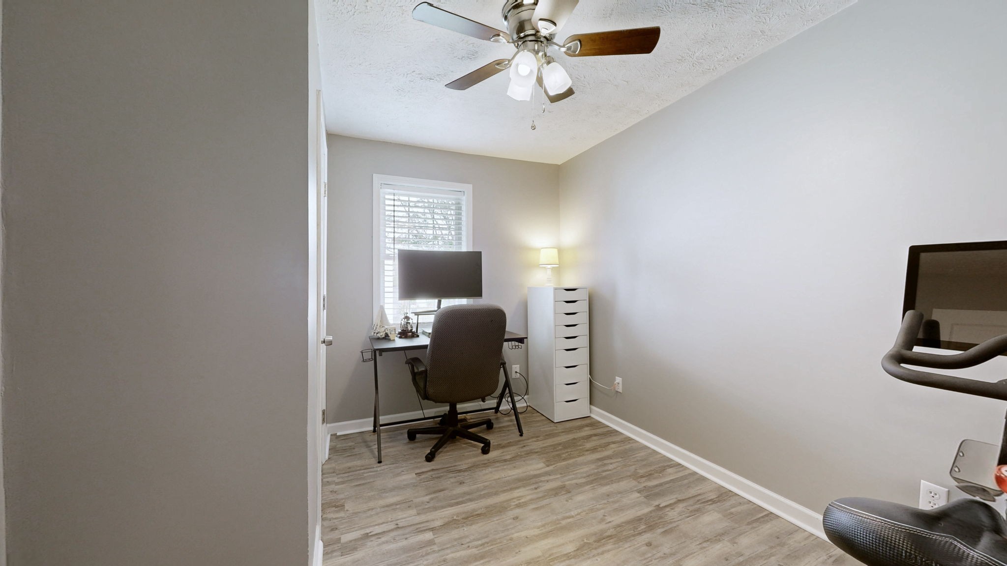 904 West Market Street Decherd, TN 37324 - Photo 12 of 26 a view of a workspace with furniture and a window