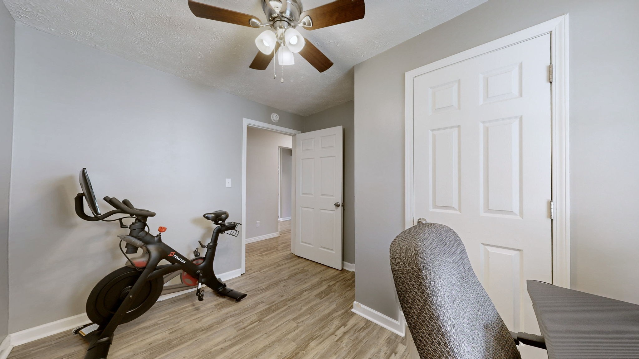 904 West Market Street Decherd, TN 37324 - Photo 13 of 26 a view of a workspace with furniture and wooden floor