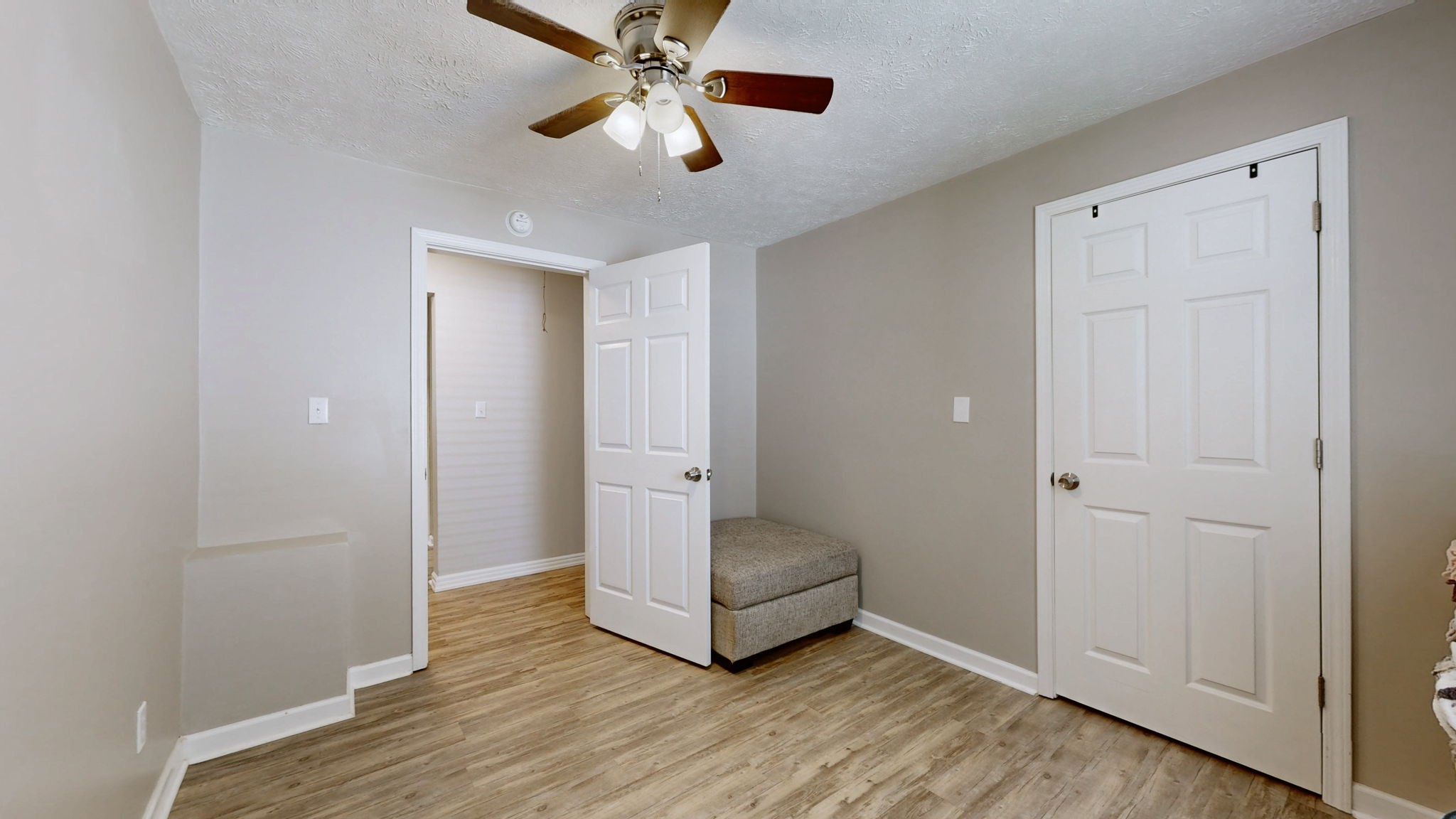904 West Market Street Decherd, TN 37324 - Photo 15 of 26 a view of an empty room and wooden floor