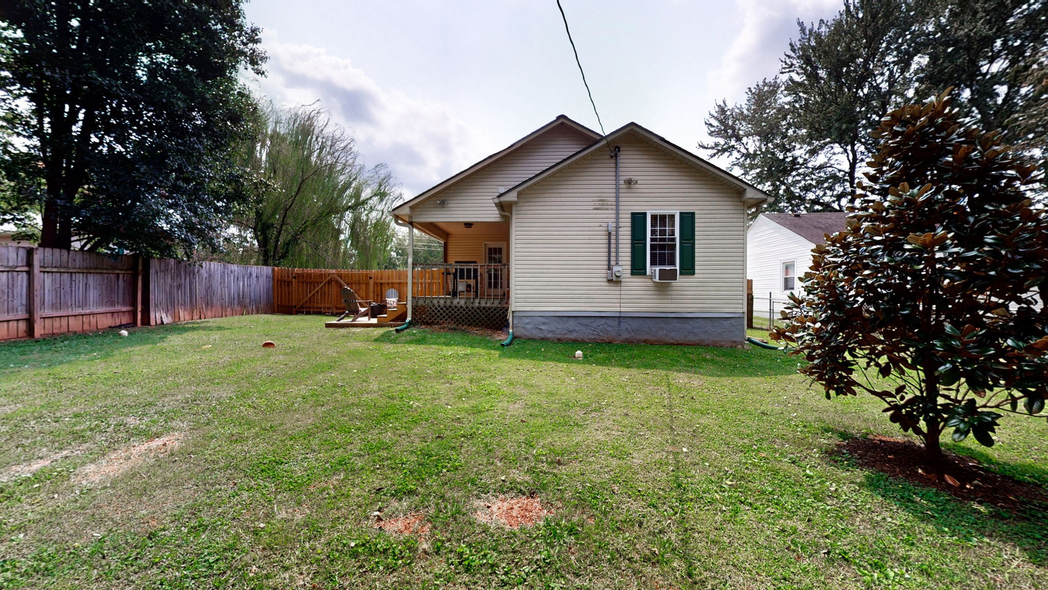 904 West Market Street Decherd, TN 37324 - Photo 18 of 26 a backyard of a house with seating space