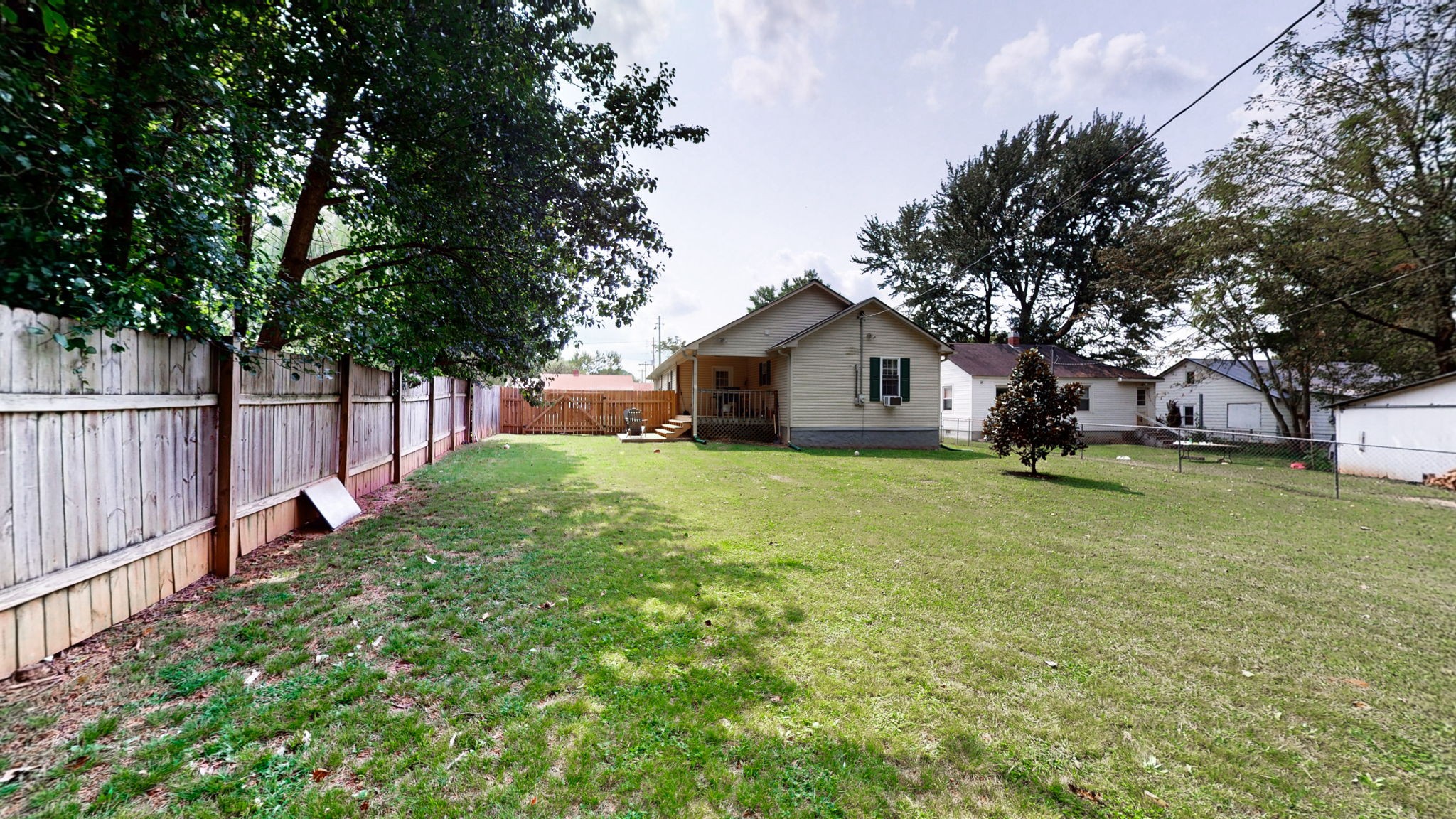 904 West Market Street Decherd, TN 37324 - Photo 21 of 26 a front view of house with yard and green space