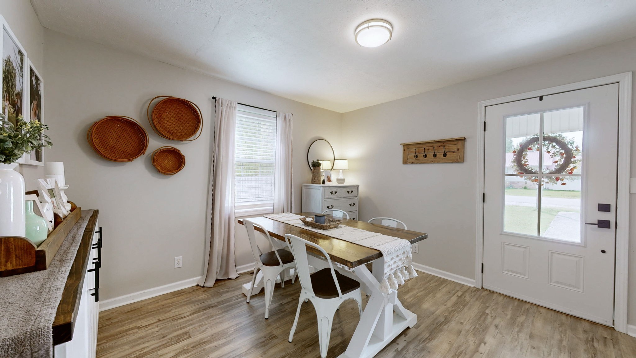 904 West Market Street Decherd, TN 37324 - Photo 4 of 26 a view of a workspace with furniture and a window