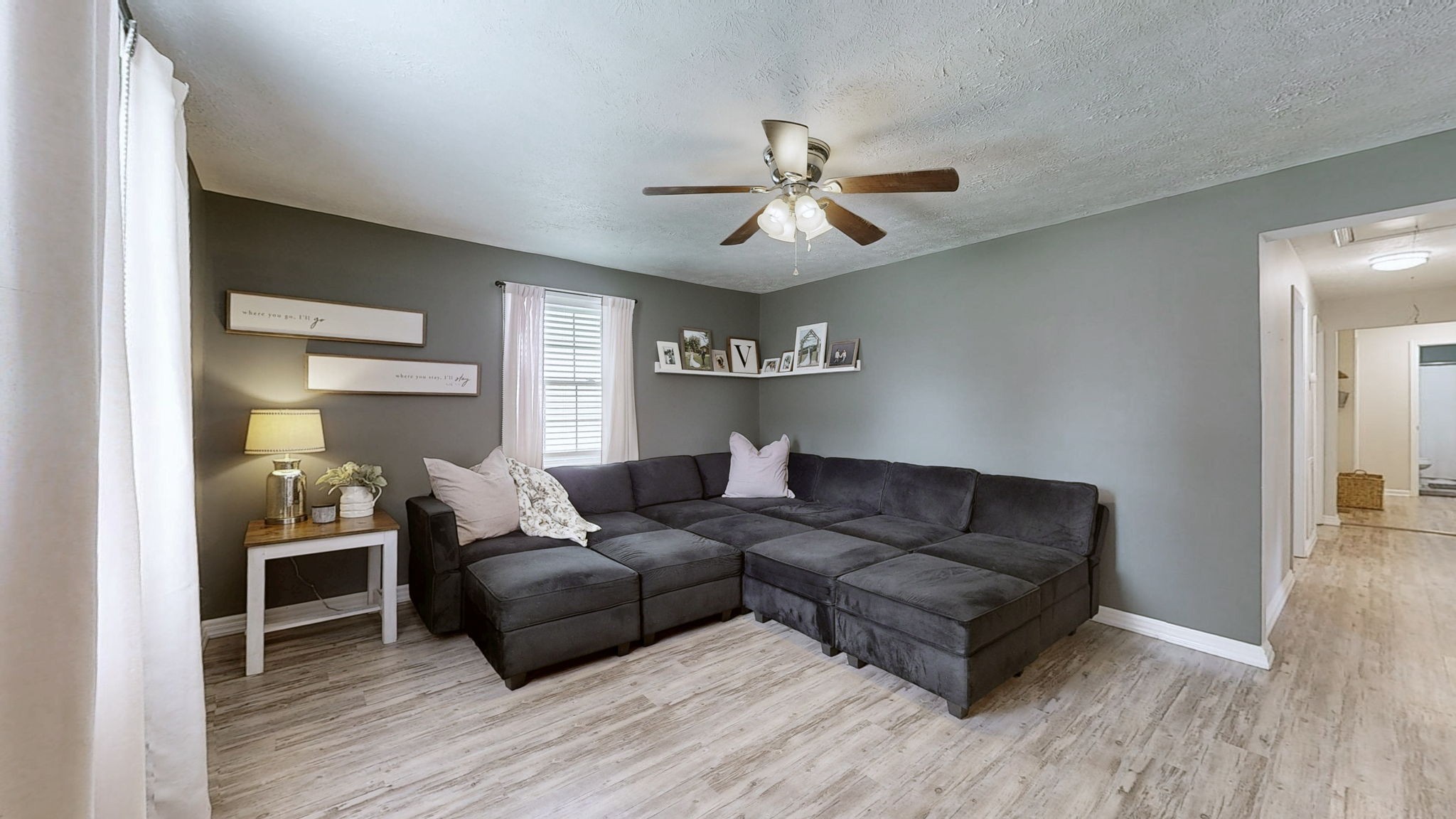 904 West Market Street Decherd, TN 37324 - Photo 5 of 26 a living room with furniture and a wooden floor