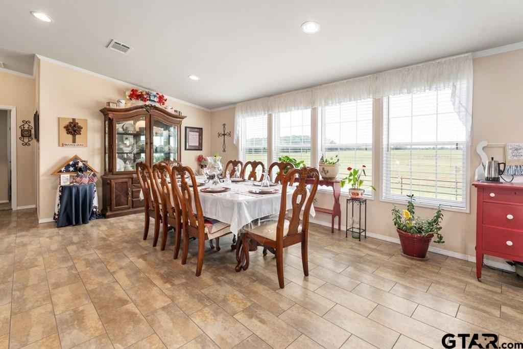 12350 County Road 2911 Eustace, TX 75124 - Photo 12 of 43 a view of a dining room with furniture