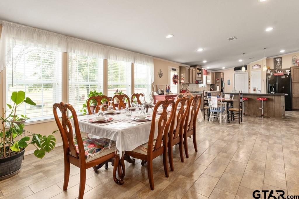 12350 County Road 2911 Eustace, TX 75124 - Photo 13 of 43 a view of a dining room with furniture window and outside view
