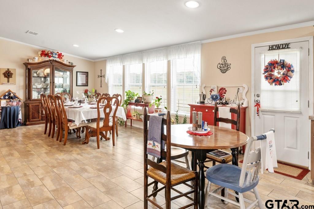 12350 County Road 2911 Eustace, TX 75124 - Photo 15 of 43 a view of a dining room with furniture window and outdoor view