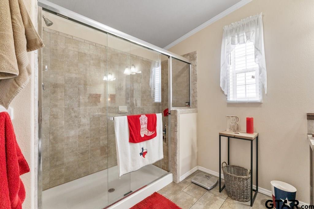 12350 County Road 2911 Eustace, TX 75124 - Photo 29 of 43 a bathroom with a shower and a sink