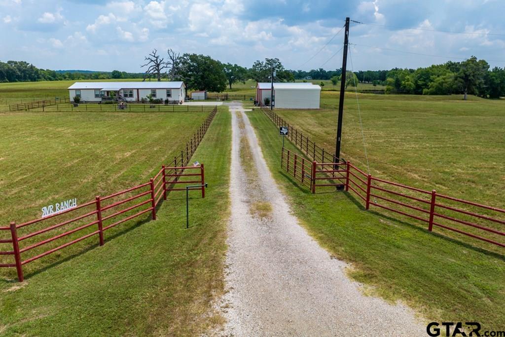 12350 County Road 2911 Eustace, TX 75124 - Photo 3 of 43 a view of a lake with a balcony