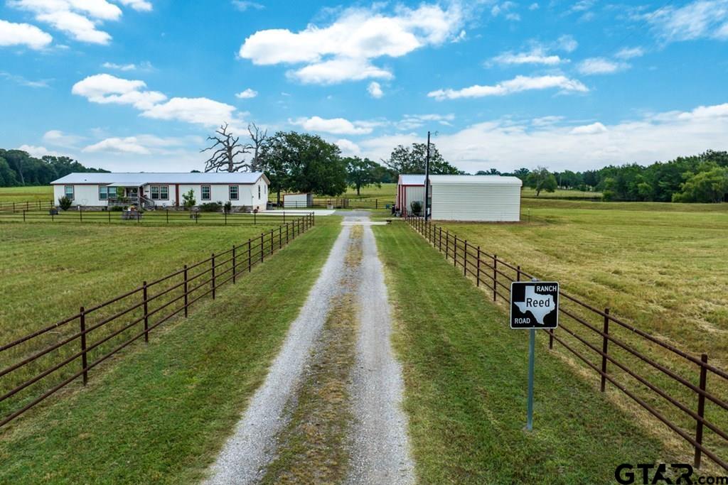12350 County Road 2911 Eustace, TX 75124 - Photo 4 of 43 a view of a lake with a big yard