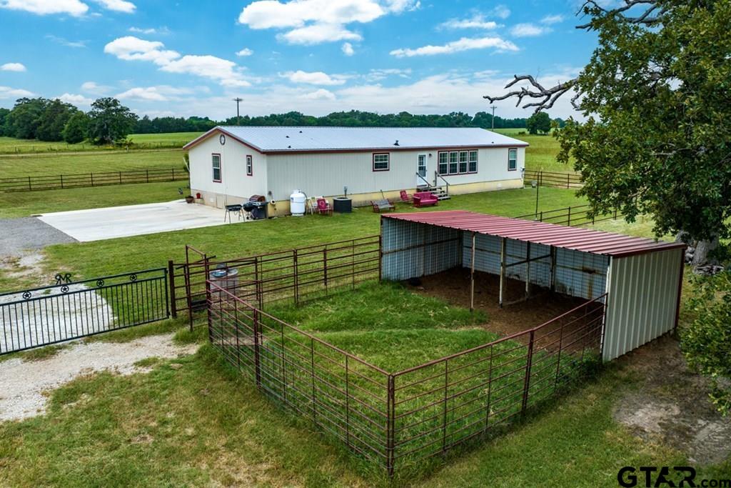 12350 County Road 2911 Eustace, TX 75124 - Photo 42 of 43 a view of a house with a yard