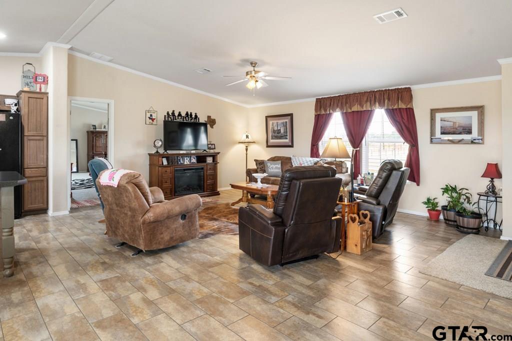 12350 County Road 2911 Eustace, TX 75124 - Photo 9 of 43 a living room with furniture and a flat screen tv