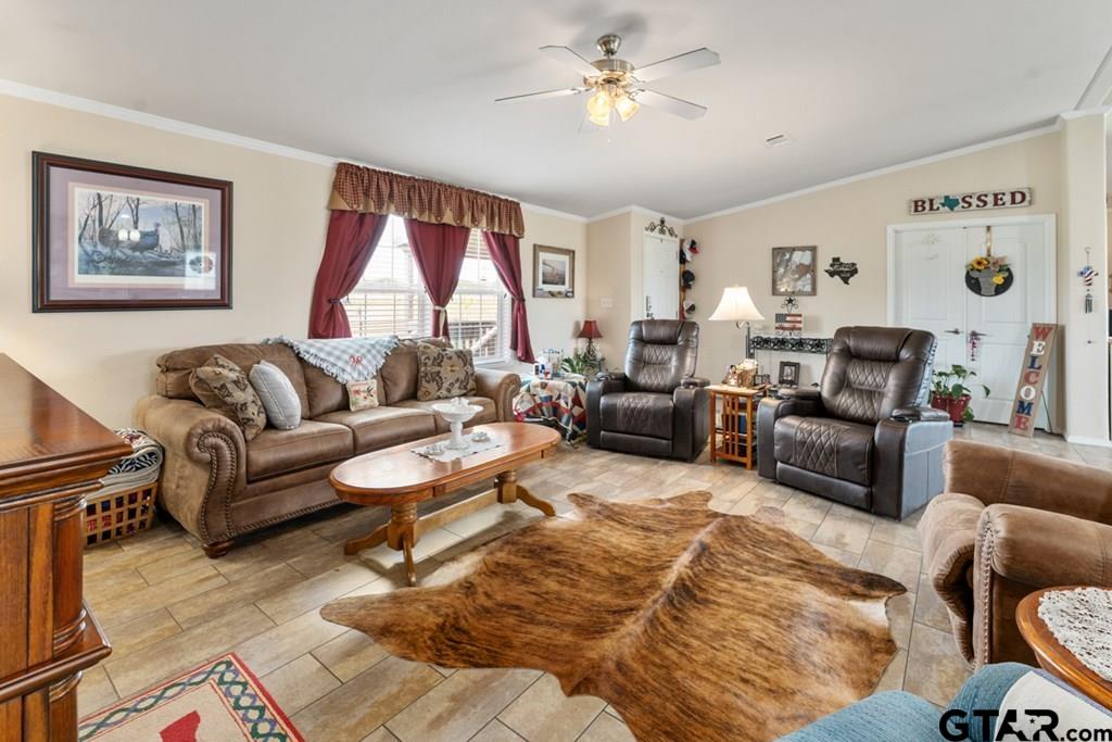 12350 County Road 2911 Eustace, TX 75124 - Photo 10 of 43 a living room with furniture and a large window