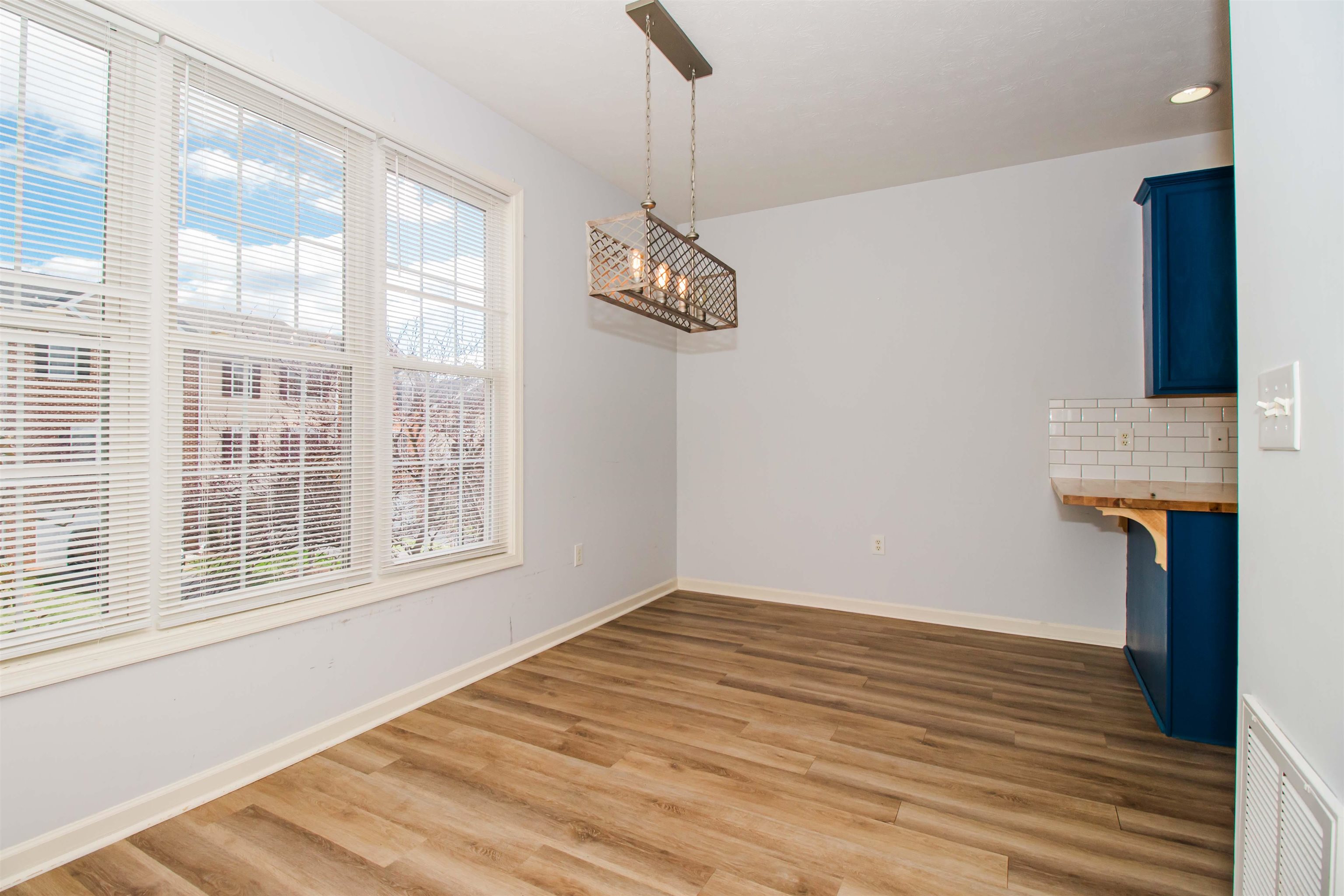 2960 Crystal Spring Lane Harrisonburg, VA 22801 - Photo 13 of 30 a view of empty room with wooden floor and fan