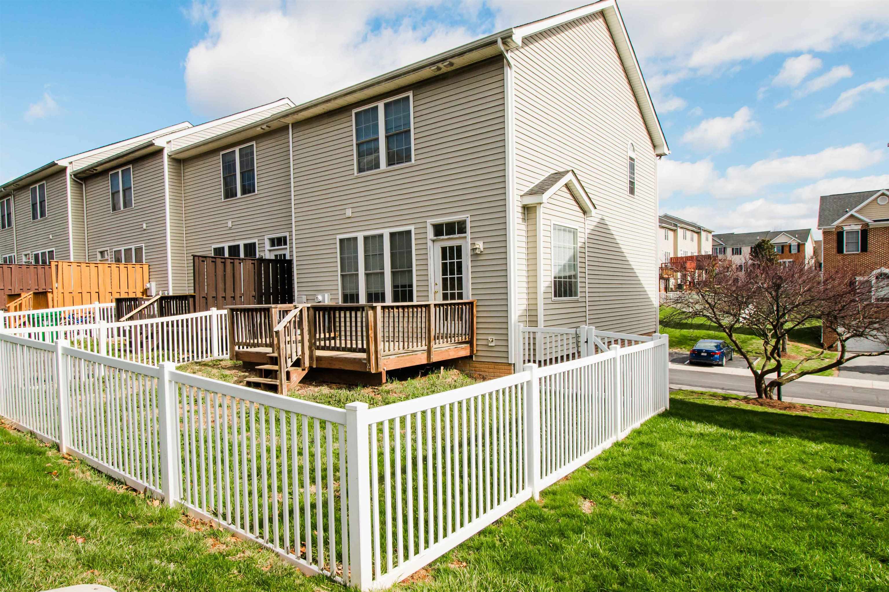 2960 Crystal Spring Lane Harrisonburg, VA 22801 - Photo 29 of 30 a front view of a house with wooden fence