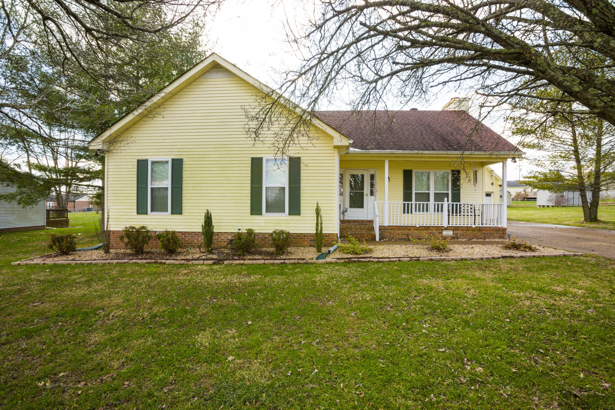 6045 Ebenezer Road Greenbrier, TN 37073 - Photo 1 of 30 a front view of house with yard and green space