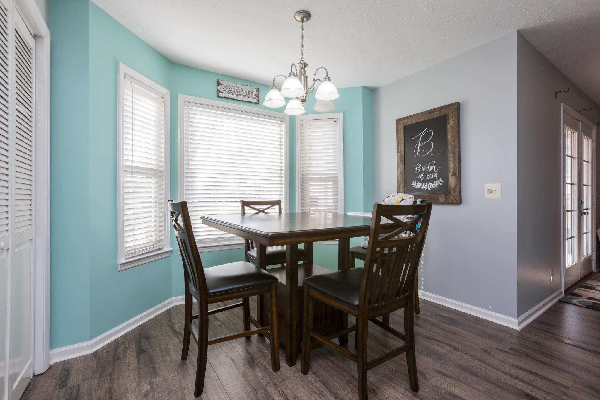 6045 Ebenezer Road Greenbrier, TN 37073 - Photo 14 of 30 a view of a dining room with furniture window and wooden floor