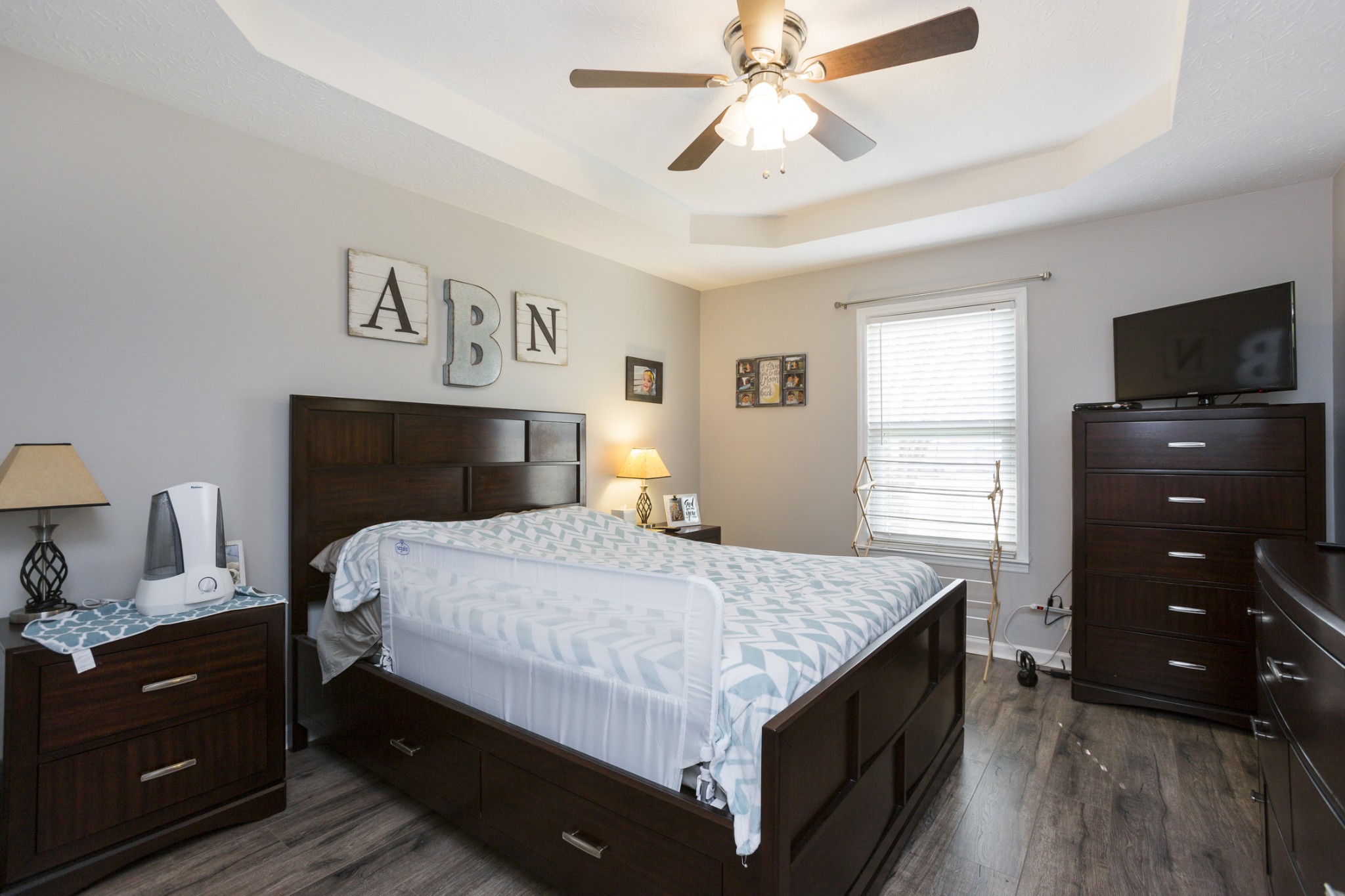 6045 Ebenezer Road Greenbrier, TN 37073 - Photo 16 of 30 a bedroom with a bed and a tv