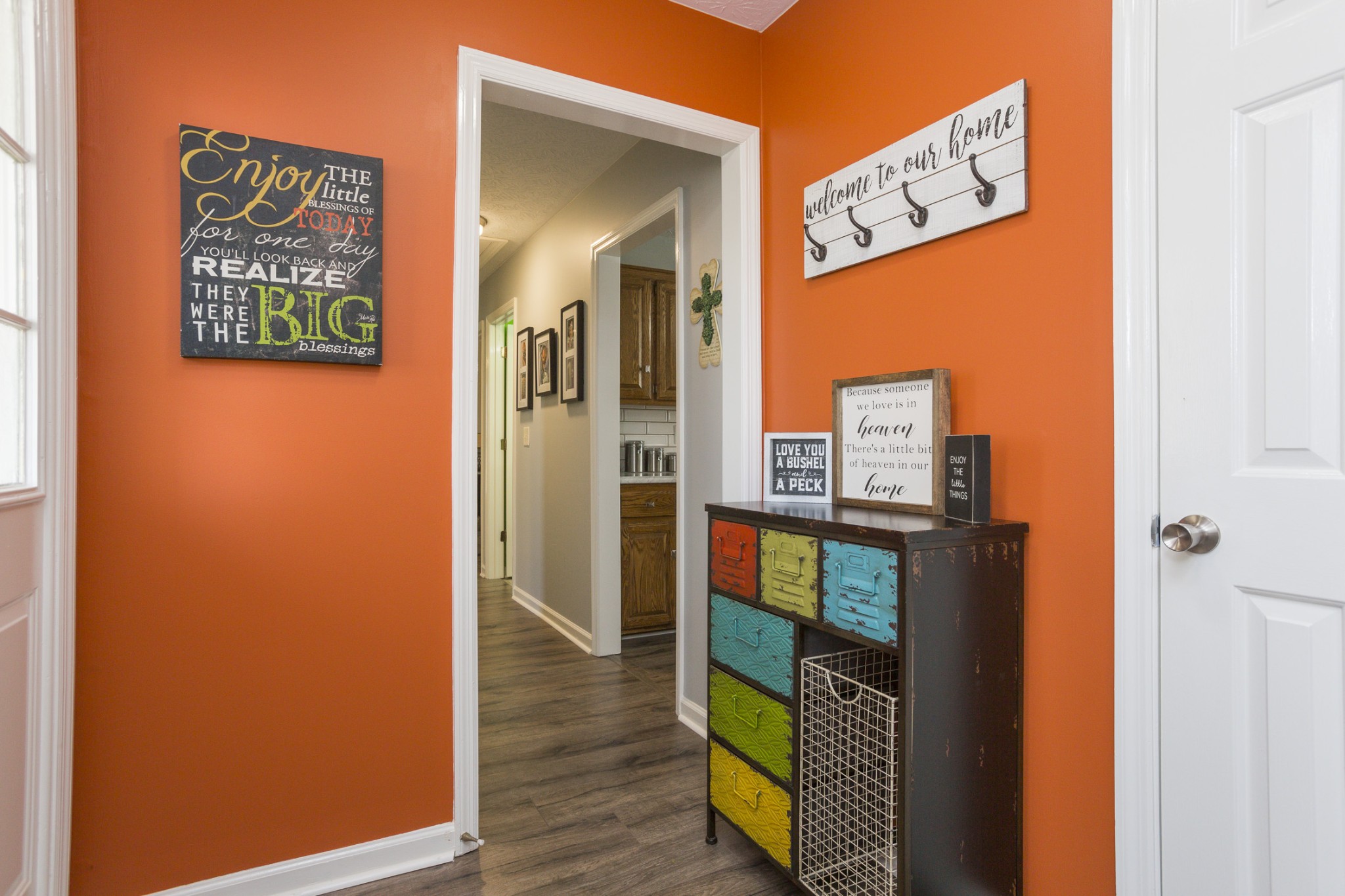 6045 Ebenezer Road Greenbrier, TN 37073 - Photo 4 of 30 a view of a hallway with wooden floor and a hallway