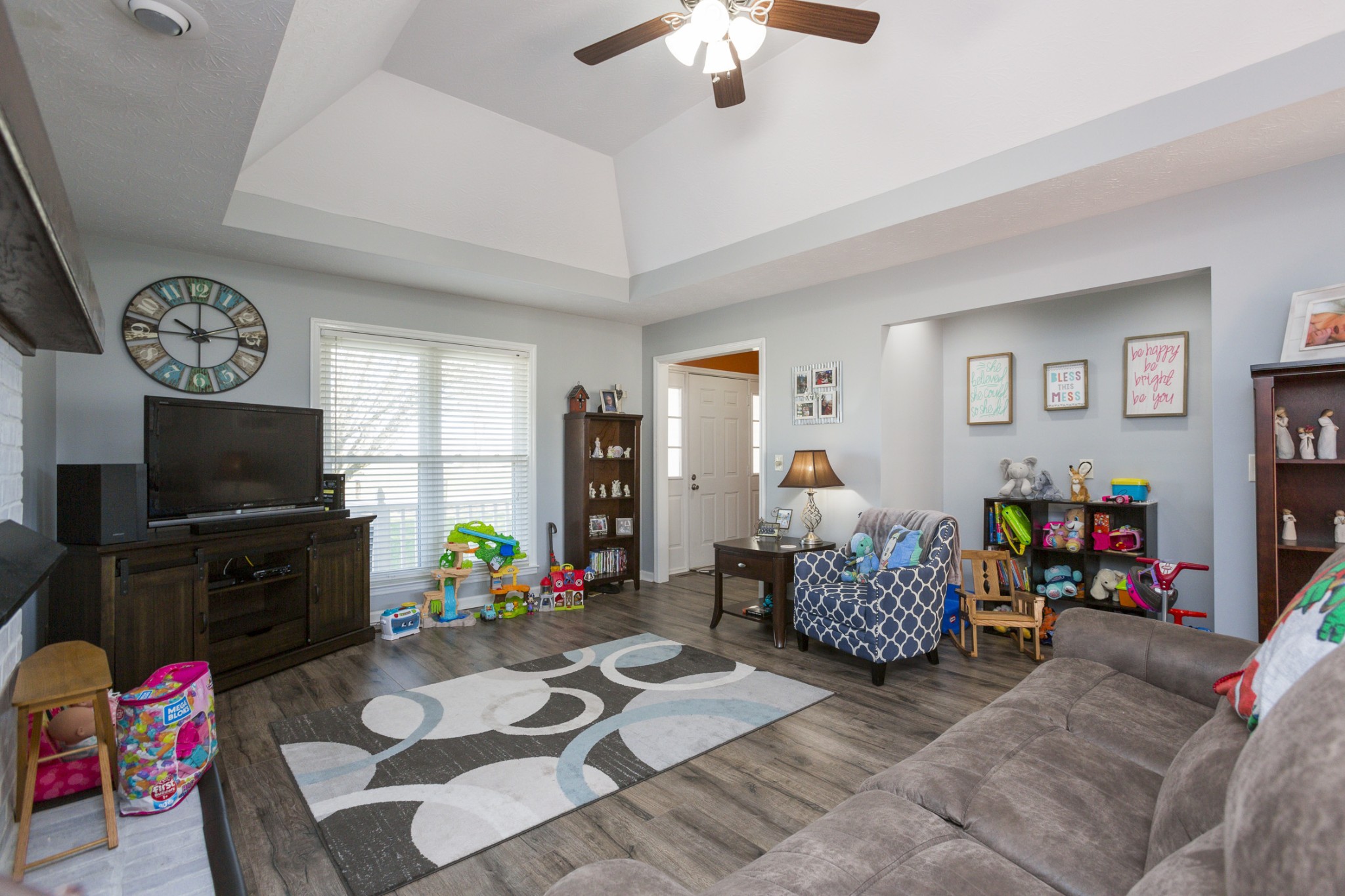 6045 Ebenezer Road Greenbrier, TN 37073 - Photo 8 of 30 a living room with furniture and a flat screen tv