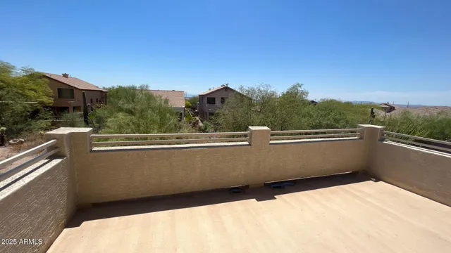 a view of balcony with furniture