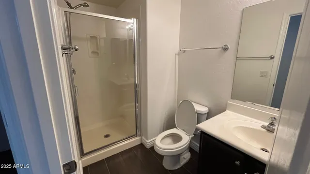a bathroom with a toilet and a sink
