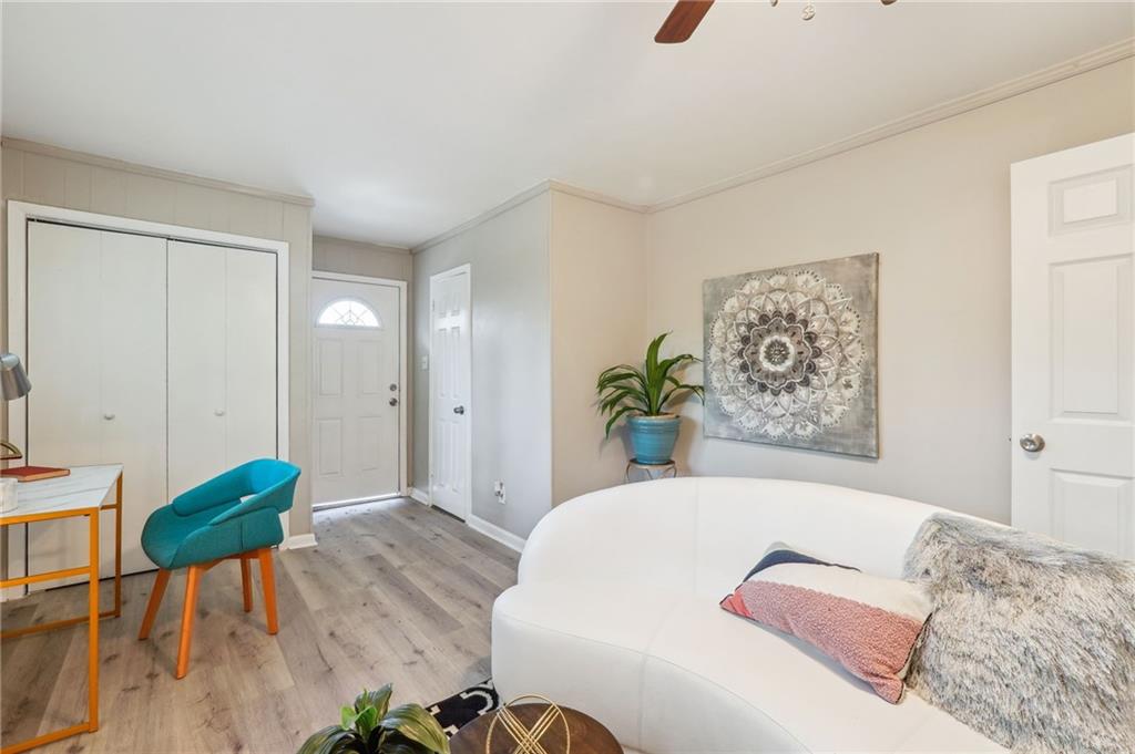 2287 Mulberry Street Atlanta, GA 30344 - Photo 12 of 18 a bedroom with a bed and a table