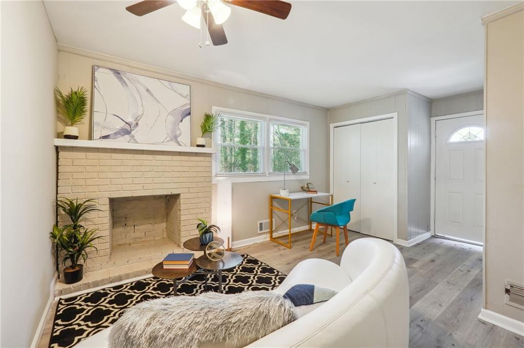 2287 Mulberry Street Atlanta, GA 30344 - Photo 10 of 18 a living room with furniture and a fireplace