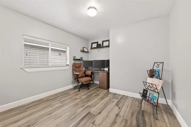 a workspace with wooden floor