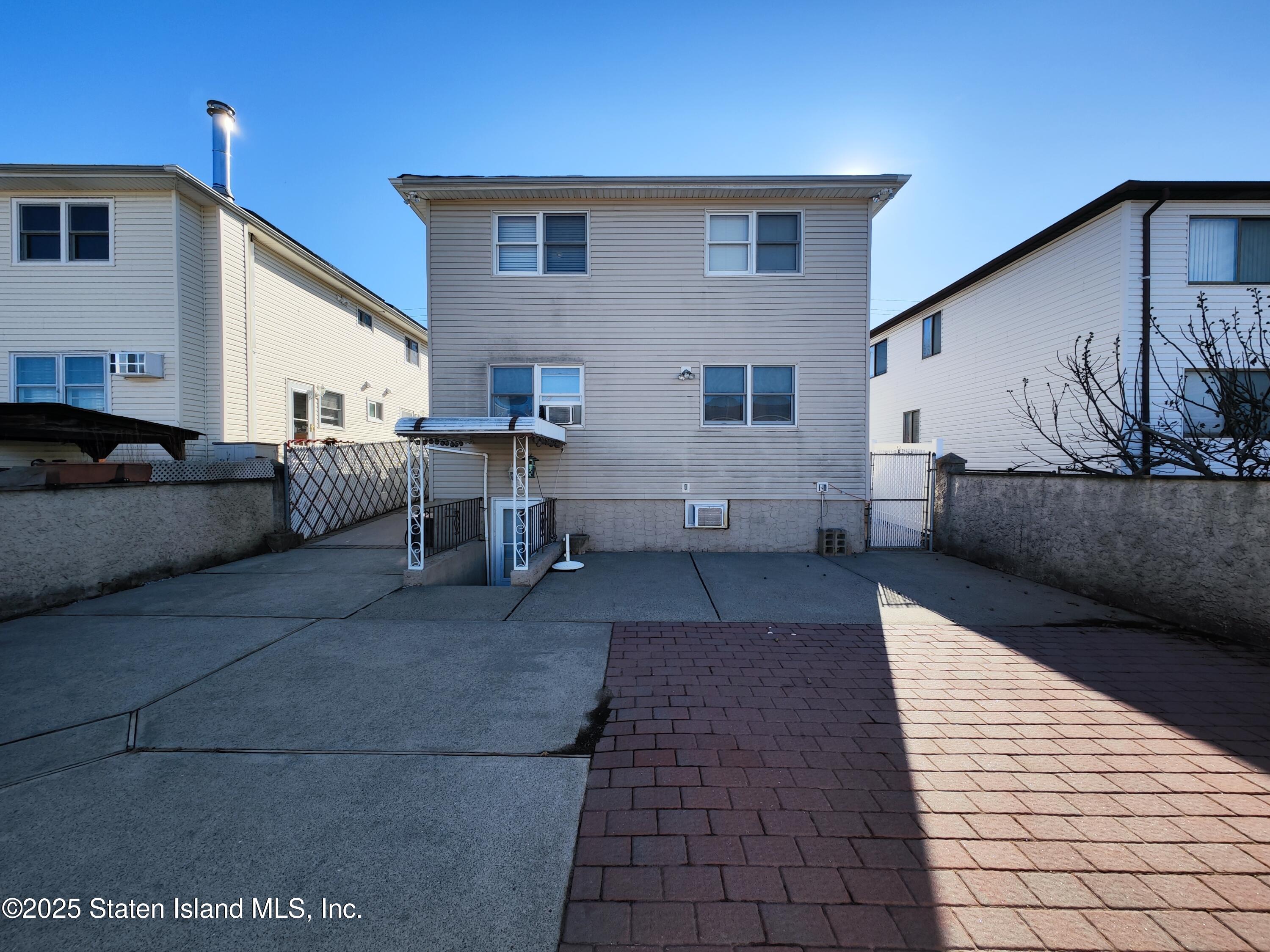 517 Rathbun Avenue Staten Island, NY 10312 - Photo 18 of 28 a view of a house with a barbeque
