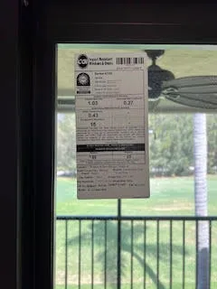 a view of a balcony with a forest view