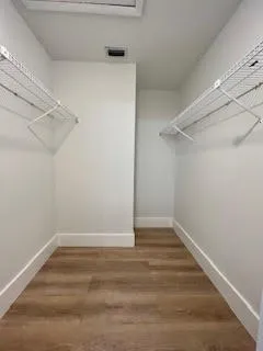 a view of a room with racks on the wall