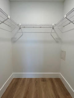 102 Pinecrest Circle, Unit C Jupiter, FL 33458 - Photo 29 of 38 a view of a room with racks on the wall