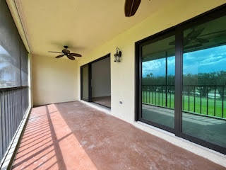 102 Pinecrest Circle, Unit C Jupiter, FL 33458 - Photo 37 of 38 a view of a backyard door