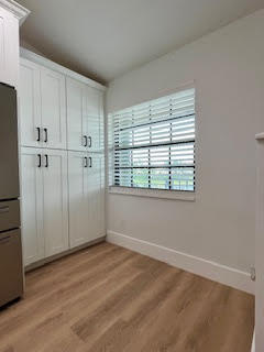 102 Pinecrest Circle, Unit C Jupiter, FL 33458 - Photo 7 of 38 a view of an empty room with a window
