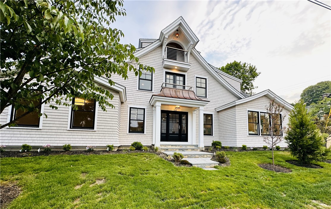 166 Ruggles Avenue Newport, RI 02840 - Photo 1 of 50 Stunning new construction with new landscaping and fencing with evergreen trees for added privacy.