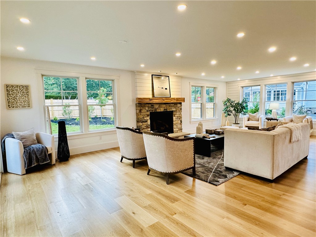 166 Ruggles Avenue Newport, RI 02840 - Photo 5 of 50 Open living area with fenced lanscaped yard adds to the privacy of this new home.