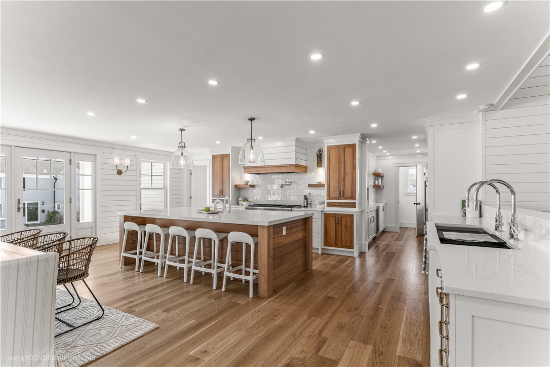 166 Ruggles Avenue Newport, RI 02840 - Photo 8 of 50 Looking down to Butler's Pantry and powder room discreetly tucked at the end.