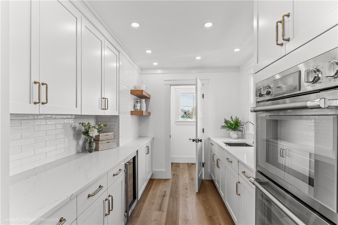 166 Ruggles Avenue Newport, RI 02840 - Photo 9 of 50 Butler's Pantry includes a second sink and dishwasher and beverage refrigerator.