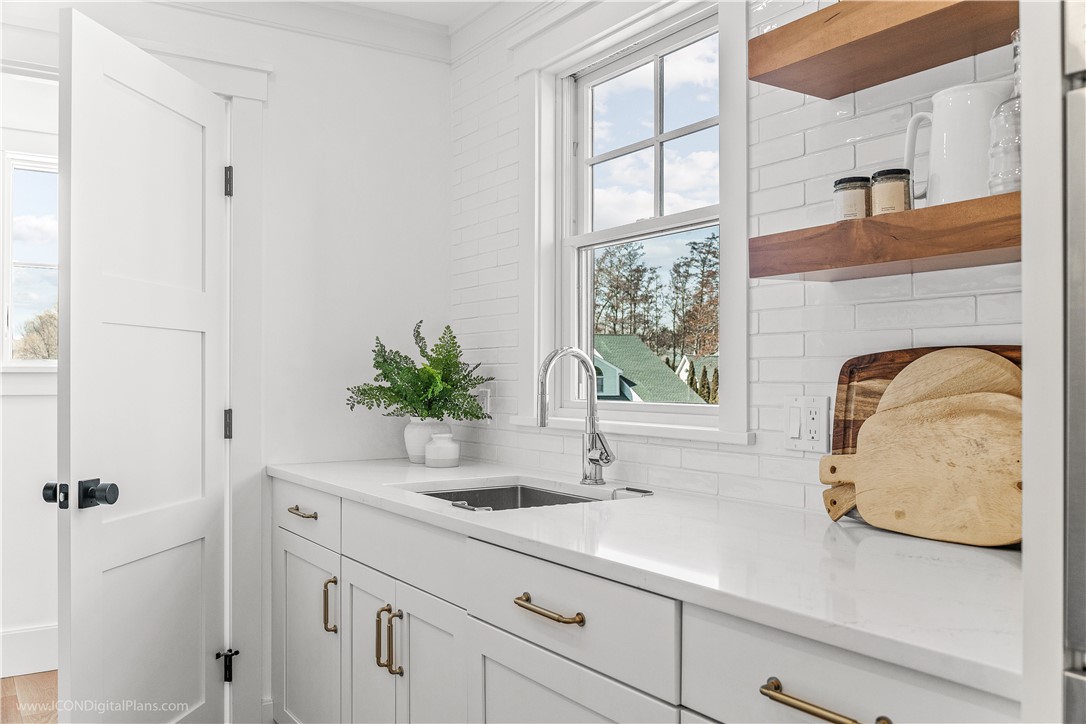 166 Ruggles Avenue Newport, RI 02840 - Photo 10 of 50 Second sink and dishwasher powder room is to the left.