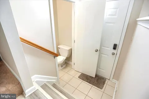 a bathroom with a sink and a glass door shower