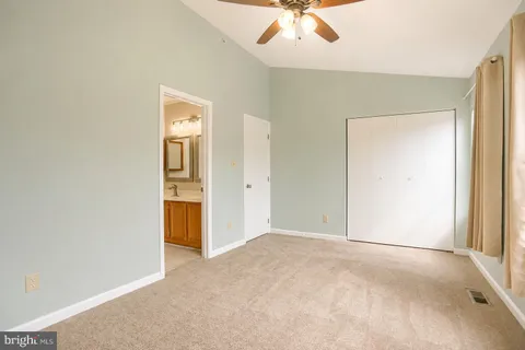 an empty room with a bathroom