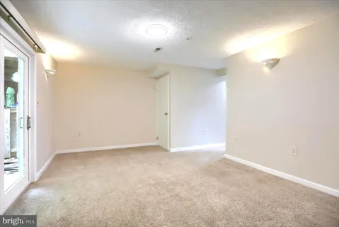 an empty room with a natural light
